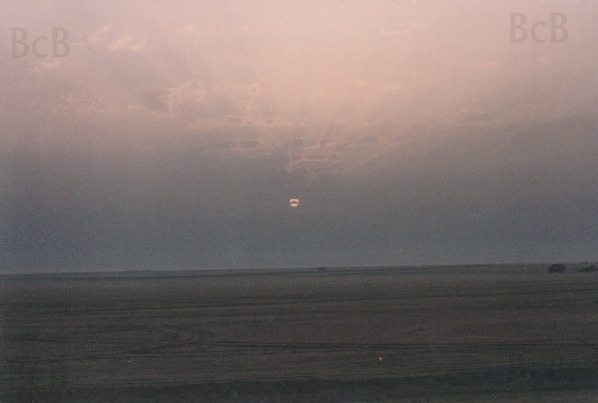 Sunrise through the smoke on the day of departure from our base camp.