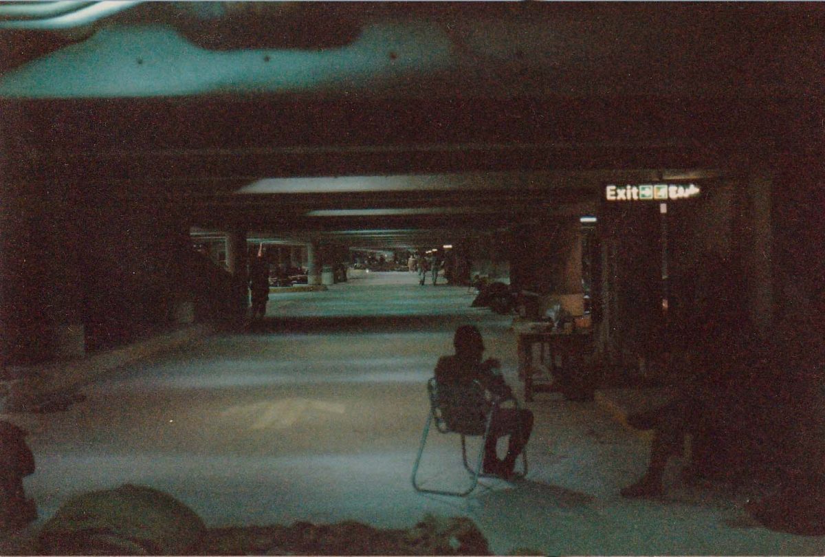King Fahd International Airport parking garage encampment